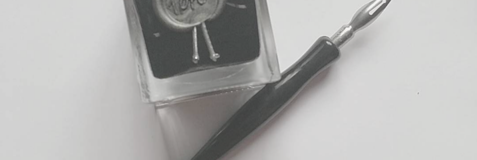 ink bottle and dip pen